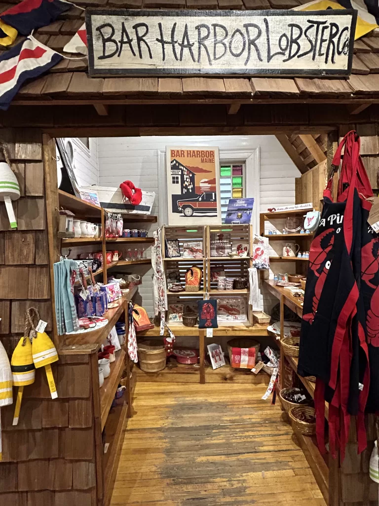 Lobster trinkets and souvenirs on shelves