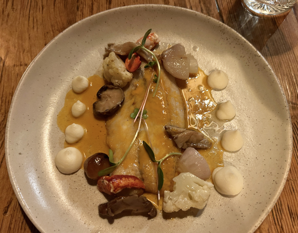 Image of a fish meal on a plate from Hidden Pond restaurant